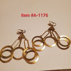 1 Pair of Gold clip on Earrings. item 1176, wt.  16 grams.